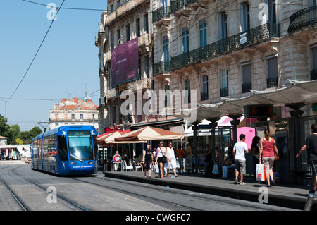 A tram at the stop in the Place de la Comédie, Montpellier, France. Stock Photo