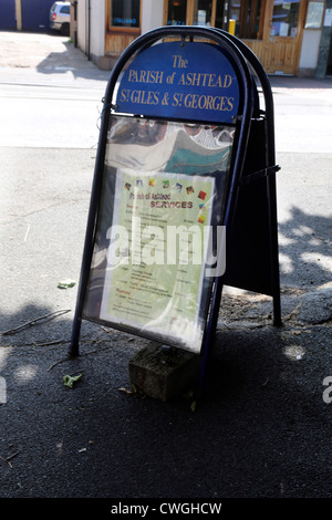 Sandwich Board Pavement Sign Notice About The Parish Of Ashtead St Giles And St Georges Services Stock Photo