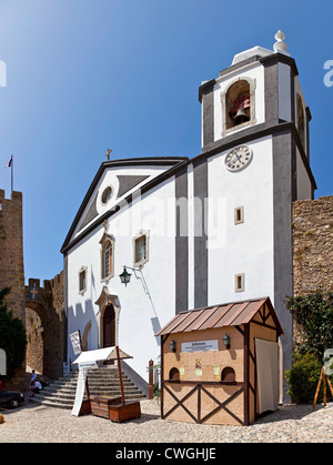 Santiago Church and Albarrã castle Tower. Óbidos, Portugal Stock Photo