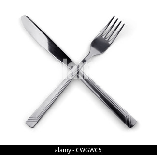 Crossed fork and knife isolated on white Stock Photo