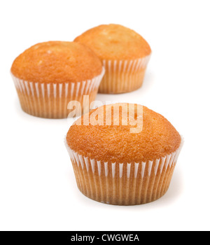 Three cupcakes with fruit filling isolated on white Stock Photo