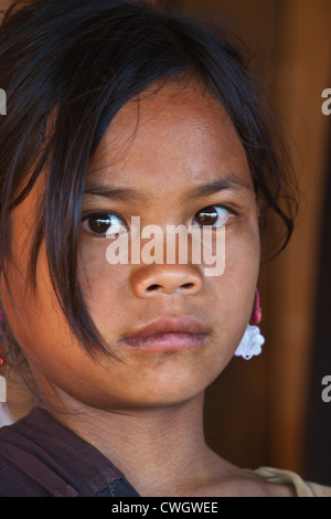 A young girl of the ANN TRIBE in a village near KENGTUNG or KYAINGTONG - MYANMAR Stock Photo