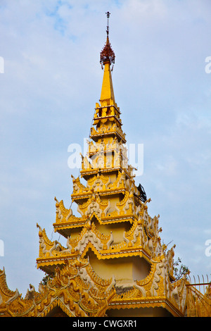Many tiered pagoda of the MAHAMUNI PAYA built by King Bodawpaya in 1784 - MANDALAY, MYANMAR Stock Photo