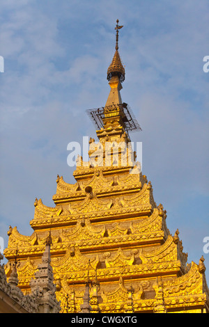 Many tiered pagoda of the MAHAMUNI PAYA or TEMPLE built by King Bodawpaya in 1784 - MANDALAY, MYANMAR Stock Photo