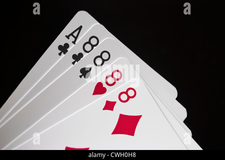 Royal Flush held by hand against black background Stock Photo