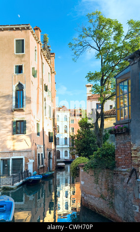 Nice summer venetian canal view with sunshine (Venice, Italy Stock ...