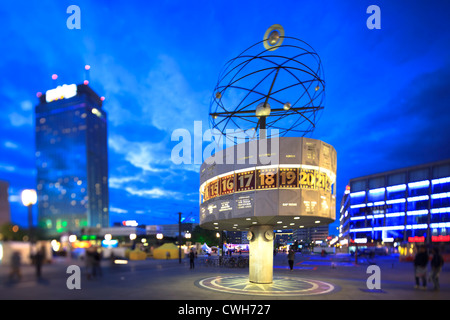 Alexanderplatz, Urania-Weltzeituhr World clock by night in tilt effect Stock Photo