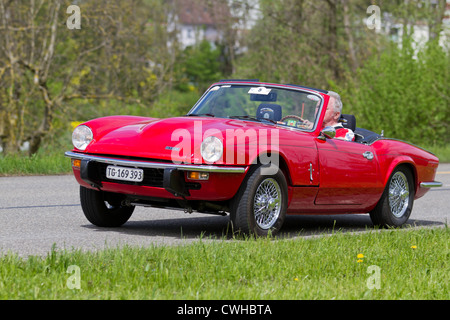 Vintage race touring car Triumph Spitfire GT6 MK III from 1971 at Grand Prix in Mutschellen, SUI on April 29, 2012. Stock Photo