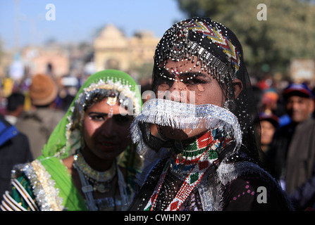 veiled Banjara women waiting for their dance programme at Dessert Festival at Jaisalmer , Rajasthan, India Stock Photo