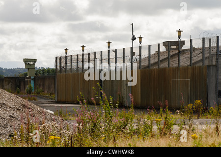 Security fences and watchtowers at the abandoned Maze Prison (Long Kesh) Stock Photo