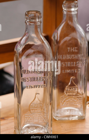 Two antique Bushmills Whiskey bottles Stock Photo