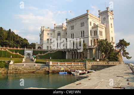 The Miramare Castle in Trieste Italy in an ornamental garden Stock Photo