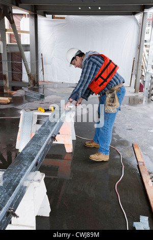 Caucasian worker on construction site Stock Photo