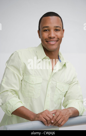 Smiling mixed race man Stock Photo