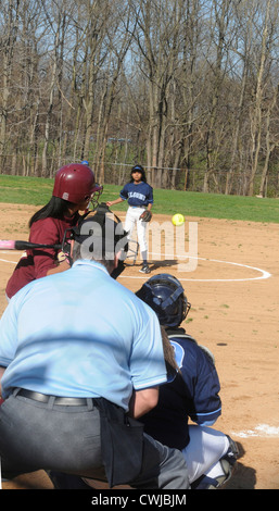 Girls high school softball game Stock Photo