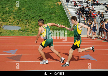 Boys relay race Stock Photo - Alamy