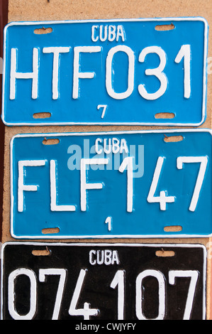 Old car license plates in street market, Trinidad, Cuba, UNESCO World Heritage Site. Stock Photo