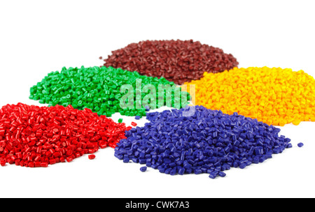 Colourful plastic polymer granules isolated on white Stock Photo