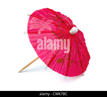 Pink paper cocktail umbrella isolated on white Stock Photo