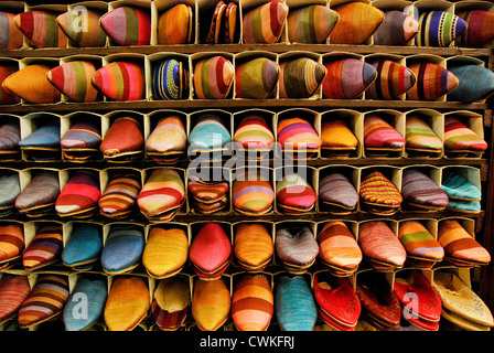 Brightly coloured traditional Moroccan slippers (babouches) in slipper souk, Marrakech, Morocco Stock Photo