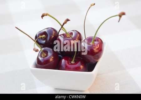 some fresh cherries on a table