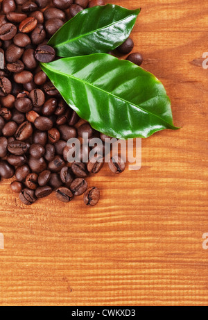 Coffee Beans over Wood Background Stock Photo