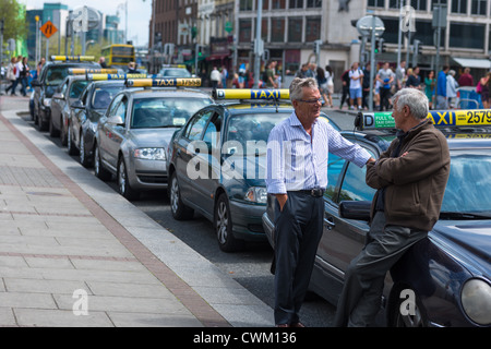 Cabbies at Dublin Taxi rank in City Centre, Republic of Ireland. Stock Photo