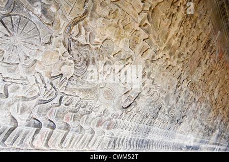 Horizontal close up view of the amazing bas-relief carvings covering the walls at Prasat Angkor Wat Stock Photo