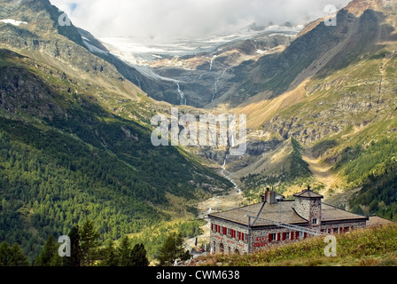 Alp Grüm Train Station and Palü Glacier, Engadine, Grisons, Switzerland Stock Photo