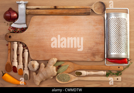 Vegetables and spices border and empty cutting board Stock Photo