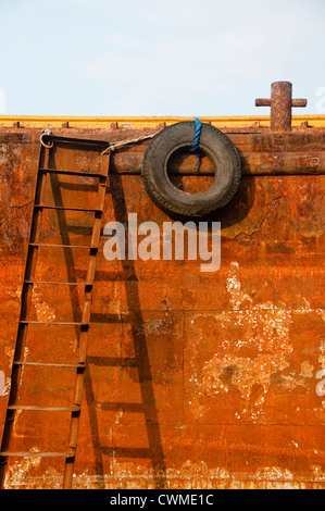Detail of an old, rusty ship abandoned on a Philippine shore Stock Photo