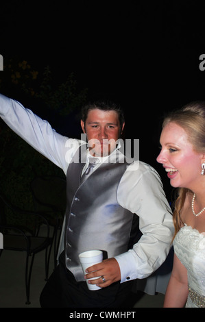 Bride and groom dancing at the wedding reception. Stock Photo