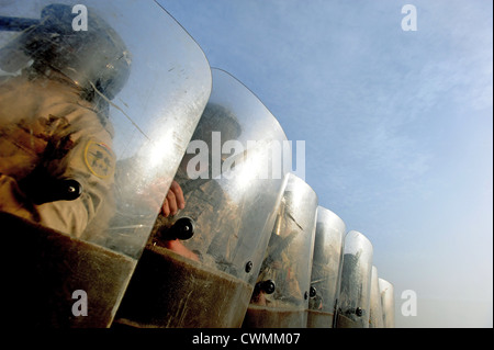 Iraqi and US Military Soldiers riot control formation Joint Security Station Constitution Stock Photo