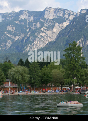 Beach on Lake Levico, at Camping Levico, Trentino, Italy Stock Photo