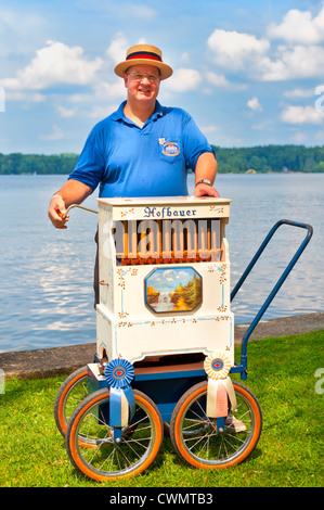 Aug. 25, 2012 - Middlebury, Connecticut, U.S. - Organ grinder DAN WILKE hand-cranking at Organ Rally at Quassy Amusement Park.