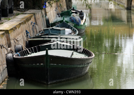 Traditional fishing boats in a row. El Palmar - La albufera. Valencia. Spain Stock Photo