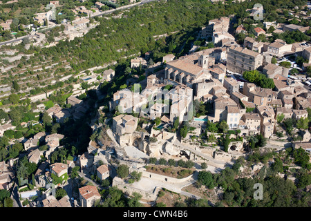 AERIAL VIEW. Hilltop medieval village. Gordes, Lubéron, Vaucluse, Provence, France. Stock Photo