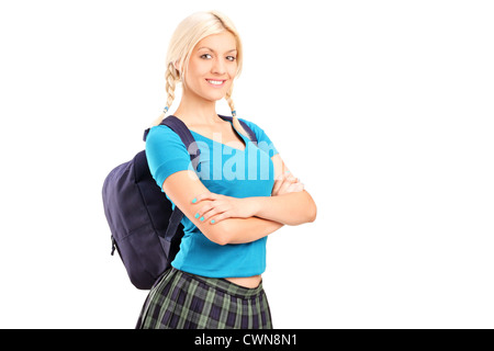 A female student standing with crossed hands, isolated on white background Stock Photo