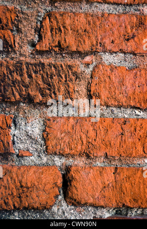 Full frame shot of red, brick wall of old church Stock Photo