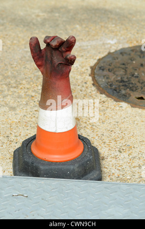 Rubber glove on traffic cone Stock Photo