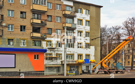 Warming of the house by polyfoam blocks. Stock Photo