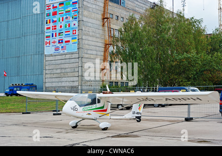 Light airplane for cruising and training on white colour Stock Photo
