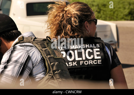 A Federal Bureau of Narcotics agent with the drug just seized, USA