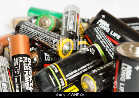 A pile of dead batteries on a white background Stock Photo