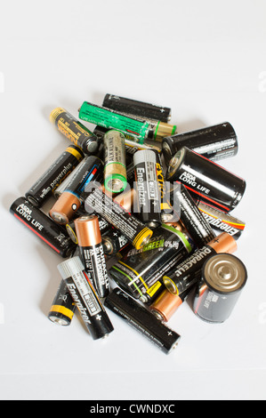 A pile of dead batteries on a white background Stock Photo