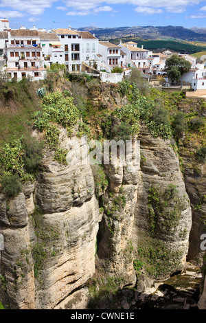 White houses of Ronda town on a high cliff in Andalusia region of Spain, Malaga province. Stock Photo