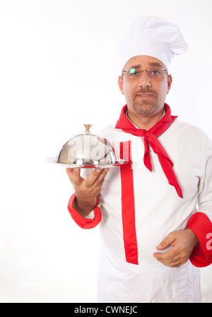 chef with metal cloche lid cover and tray Stock Photo