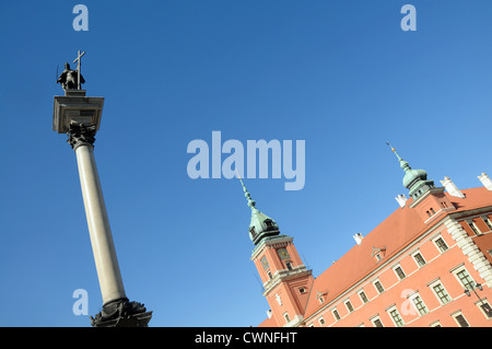 king Sigismund III Vasa Column and Royal Castle on Old Town in Warsaw, Poland Stock Photo