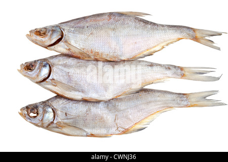 three salt dried fishes isolated on white background Stock Photo