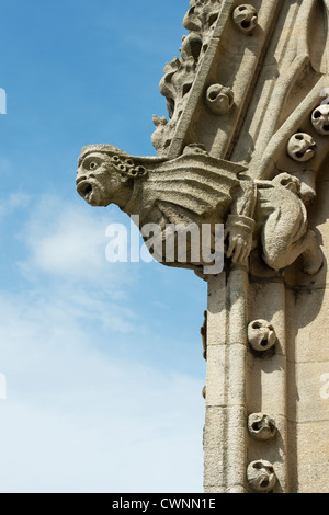 Carved stone gargoyle on the tower of the University Church of St Mary the Virgin, Oxford, England Stock Photo